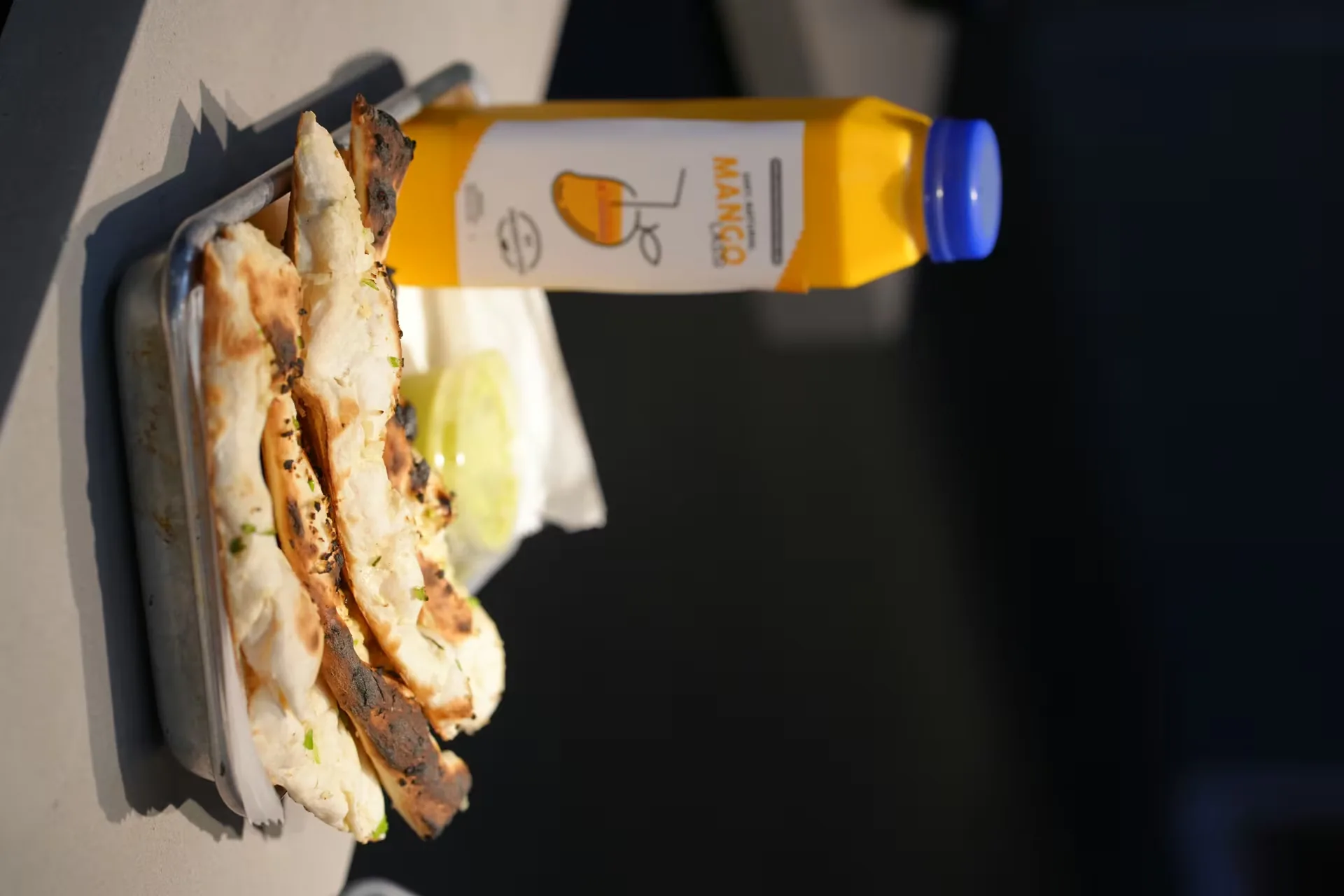 Butter naan with a mango drink