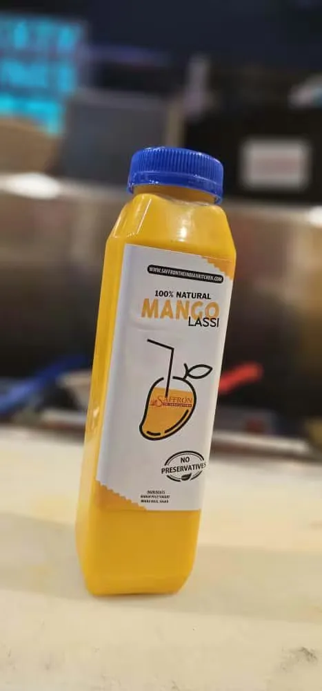 Mango lassi in a tall glass