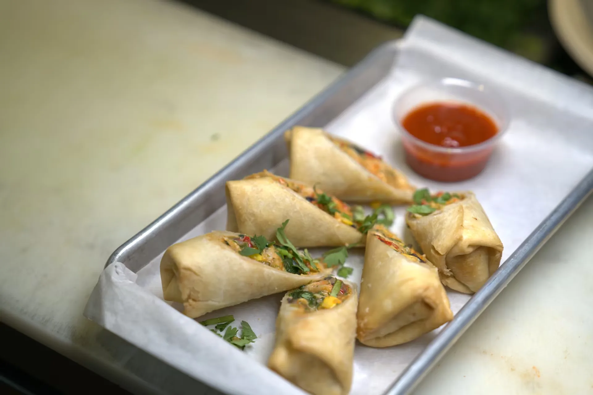 Golden spring rolls with dipping sauce